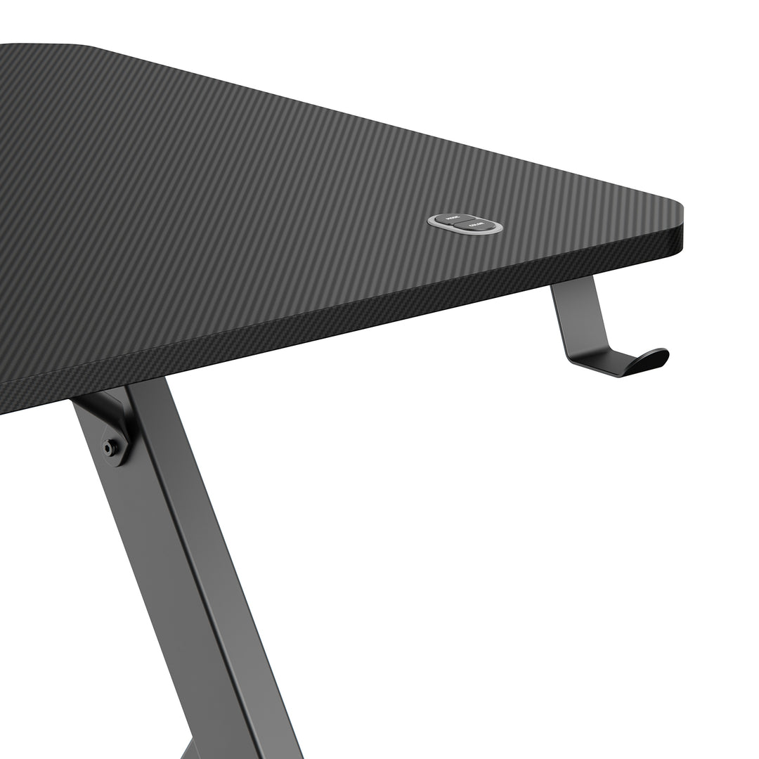 Birou de gaming NanoRS, negru, cu suport pentru căști și pahare, retroiluminare RGB, max. 75kg, dimensiuni 1200x600x750mm, RS102