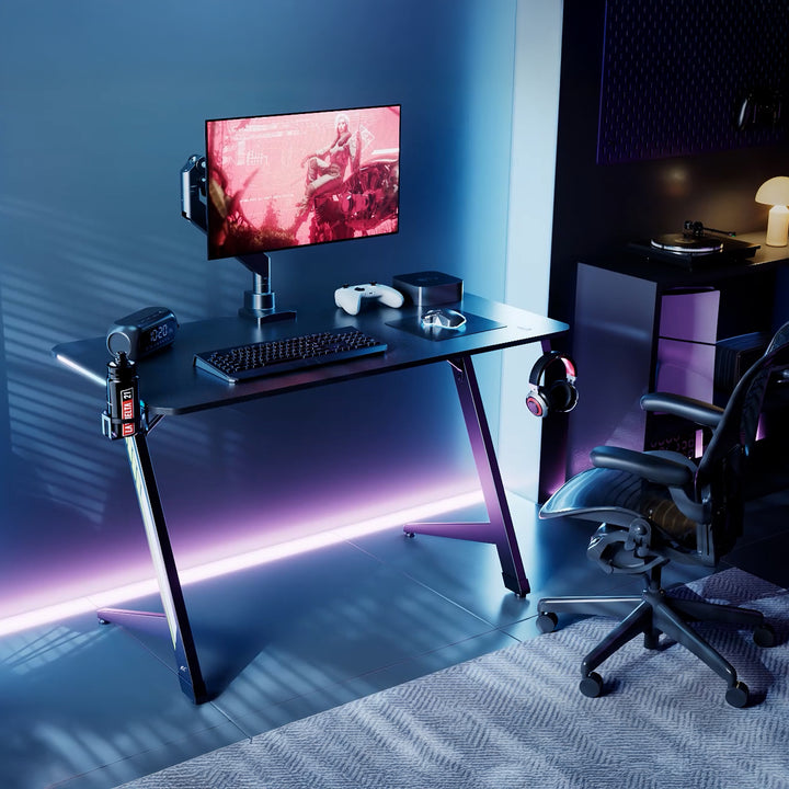 Birou de gaming NanoRS, negru, cu suport pentru căști și pahare, retroiluminare RGB, max. 75kg, dimensiuni 1200x600x750mm, RS102