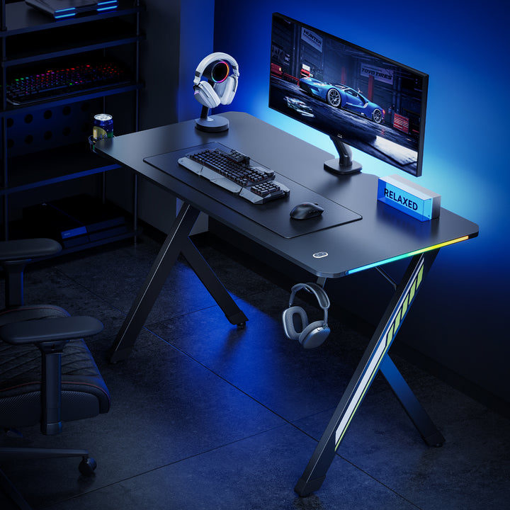 Birou de gaming NanoRS, negru, cu suport pentru căști și pahare, retroiluminare RGB, max. 75kg, dimensiuni 1200x600x750mm, RS102